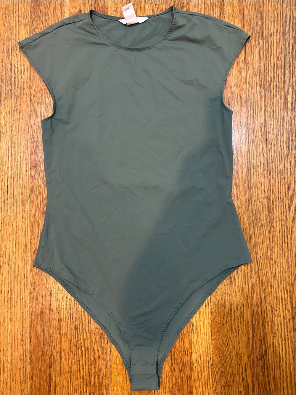 H & M Olive Green One-Piece Bodysuit. Size medium